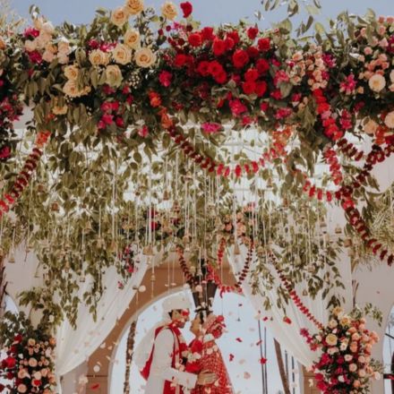 Wedding stage decorated with fresh flower garlands in Delhi