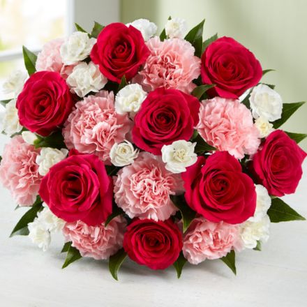 Red rose anniversary bouquet tied with ribbon